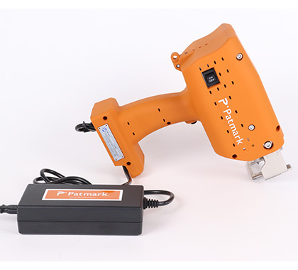 A product image of the orange Patmark lying on the ground with adapter