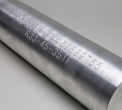 Image of a cylindrical large round bar engraved with text and numbers 'SA36220-1 74456889765 R33-45-35TF'