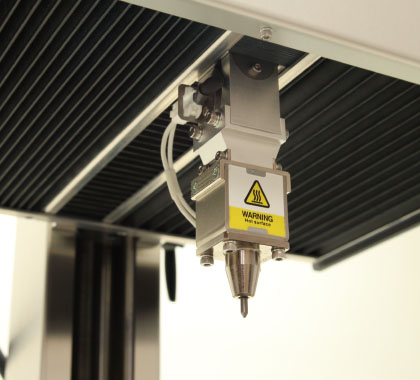 Image of the engraving drill section with shutter on the bottom view of the MarkinBOX Series MB2015 main unit