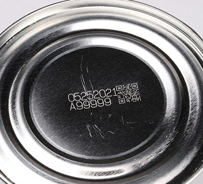 Image of the product number '05252021 A99999' and the QR code engraved on the bottom (outside) of the can.