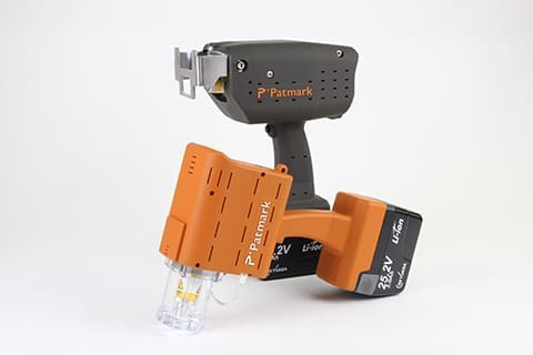 Image of two Patmark Series units, one in orange and one in black, placed side by side.